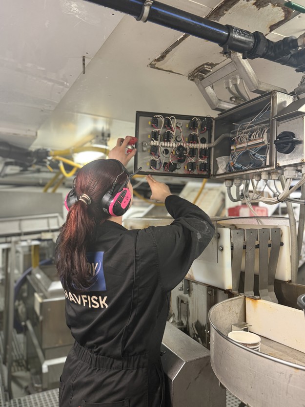 Stine Marie working in the engine room. 