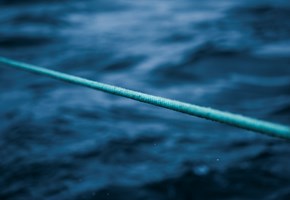 Green rope from fishing boat