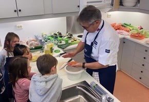 Children on the kitchen preparing food