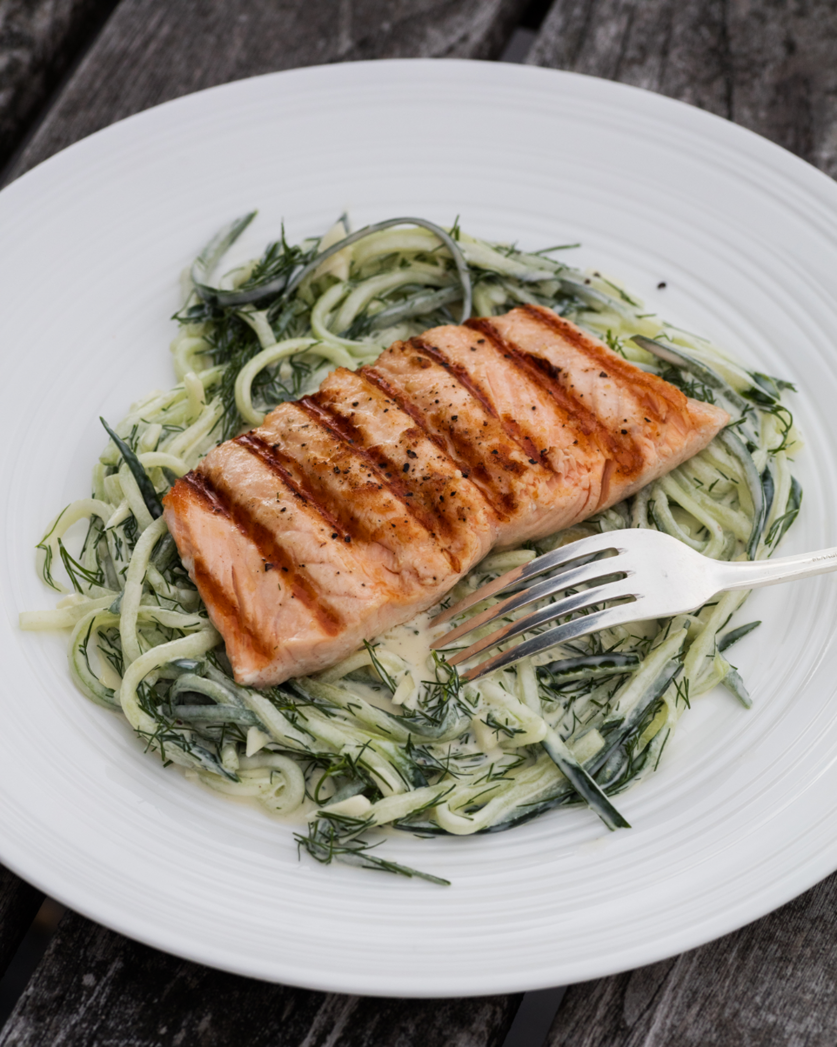 Grilled salmon with cucumber salad