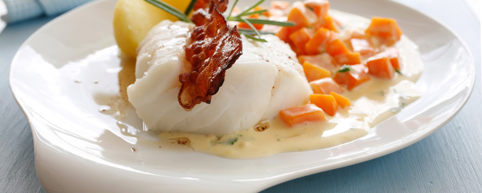 Kokt torsk med gulrotstuing