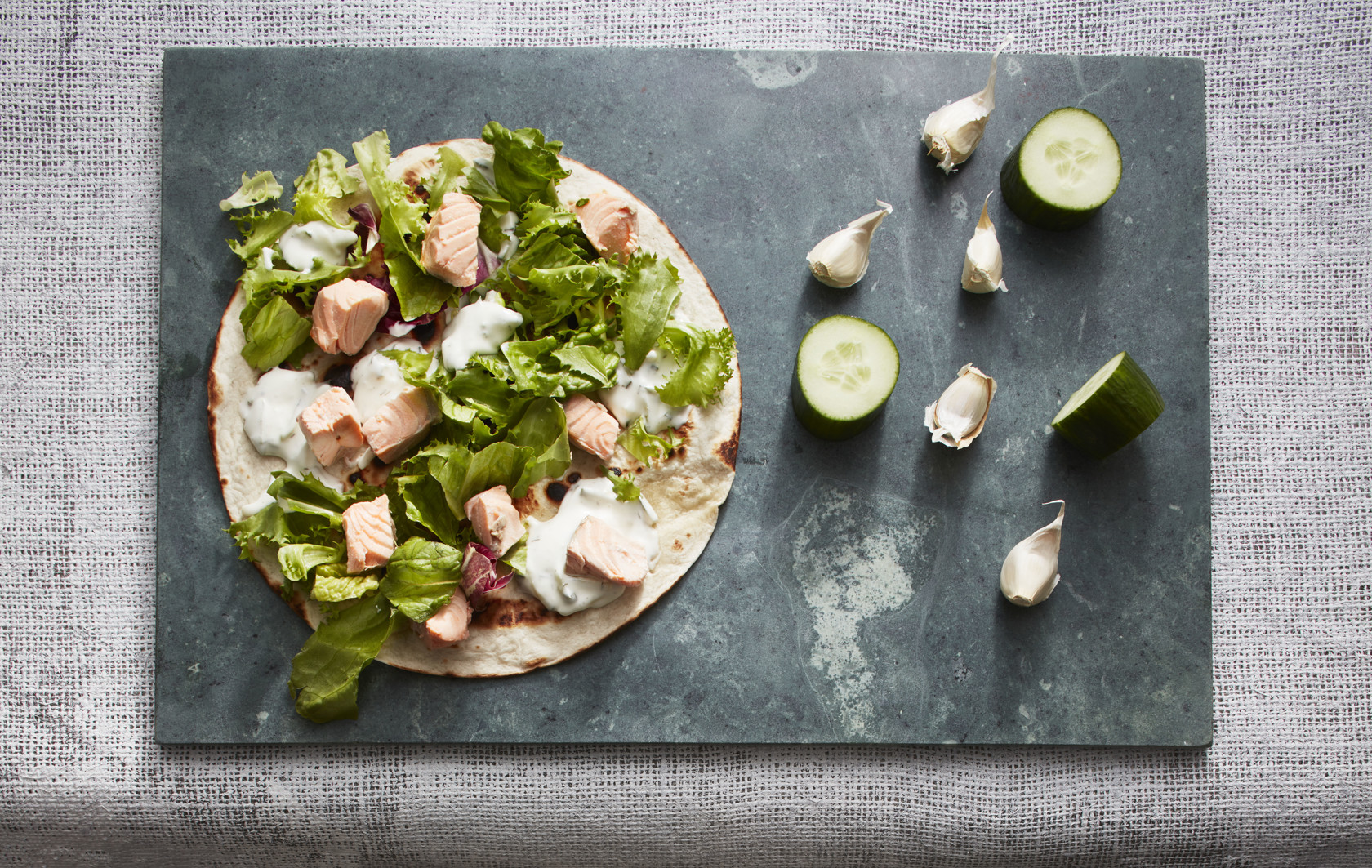 Wraps with salmon,​ mixed salad and tzatzki​ ​