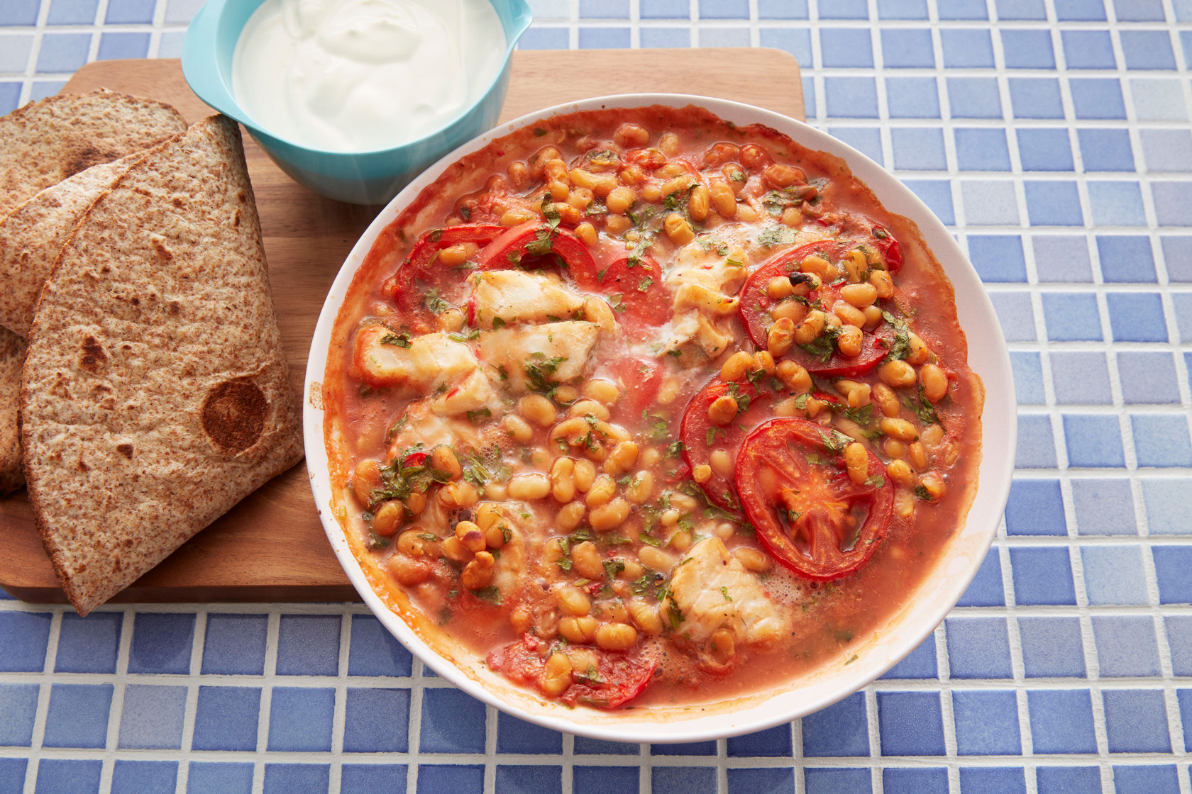 Baked pollock with baked beans