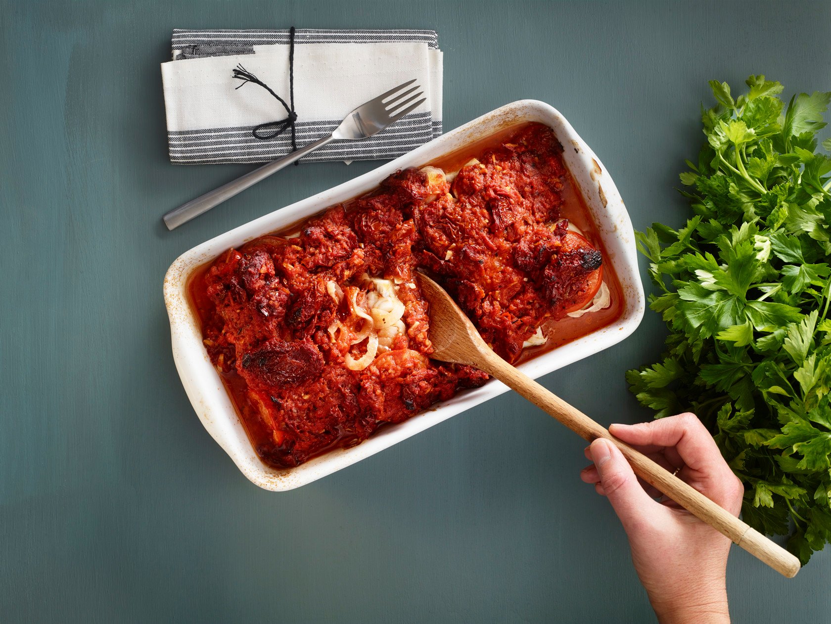 Baked pollock with tomato​