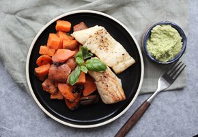 Cod with hummus and roasted root vegetables
