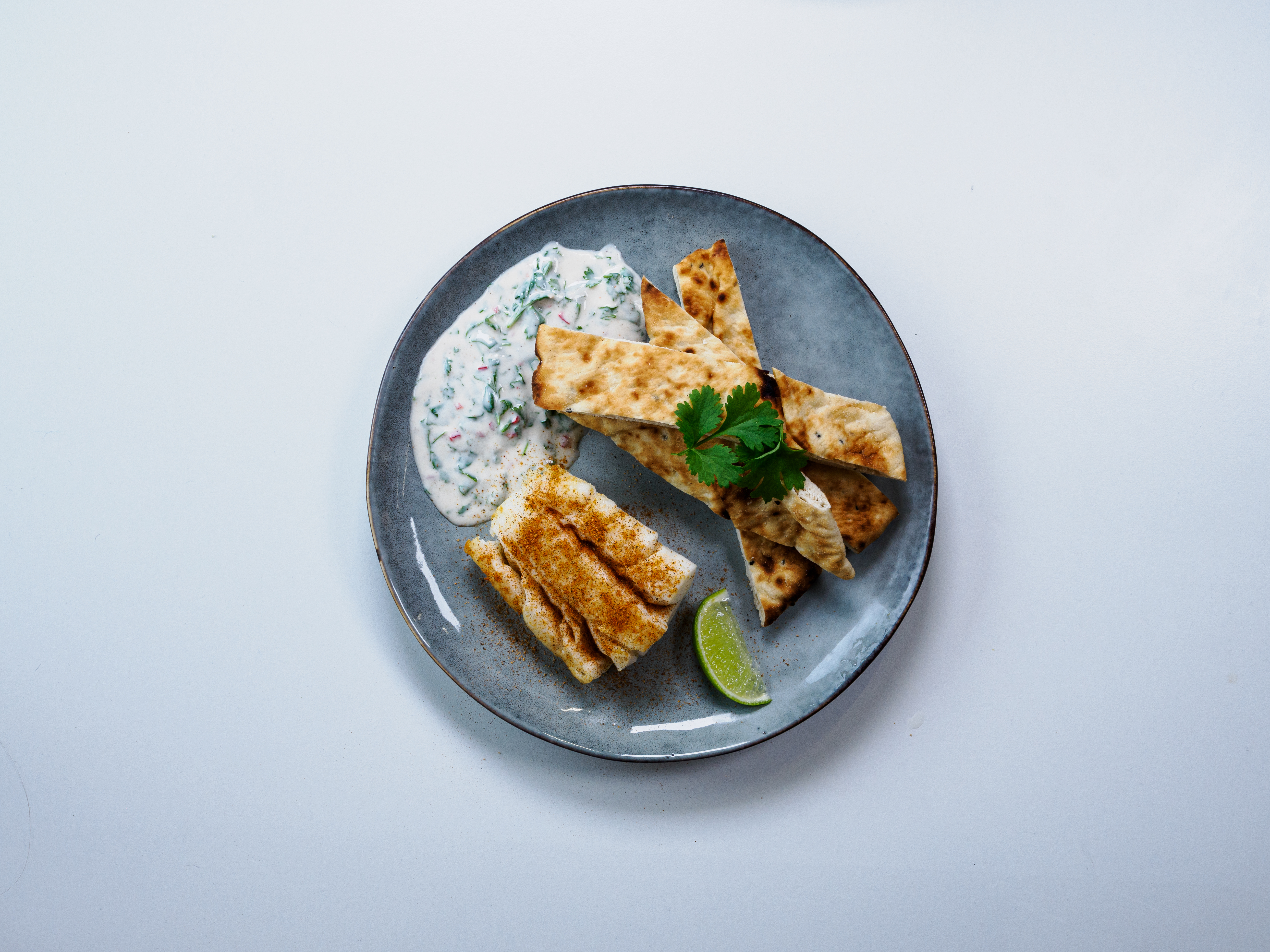Torsk tandoori med korianderdressing og nanbrød 