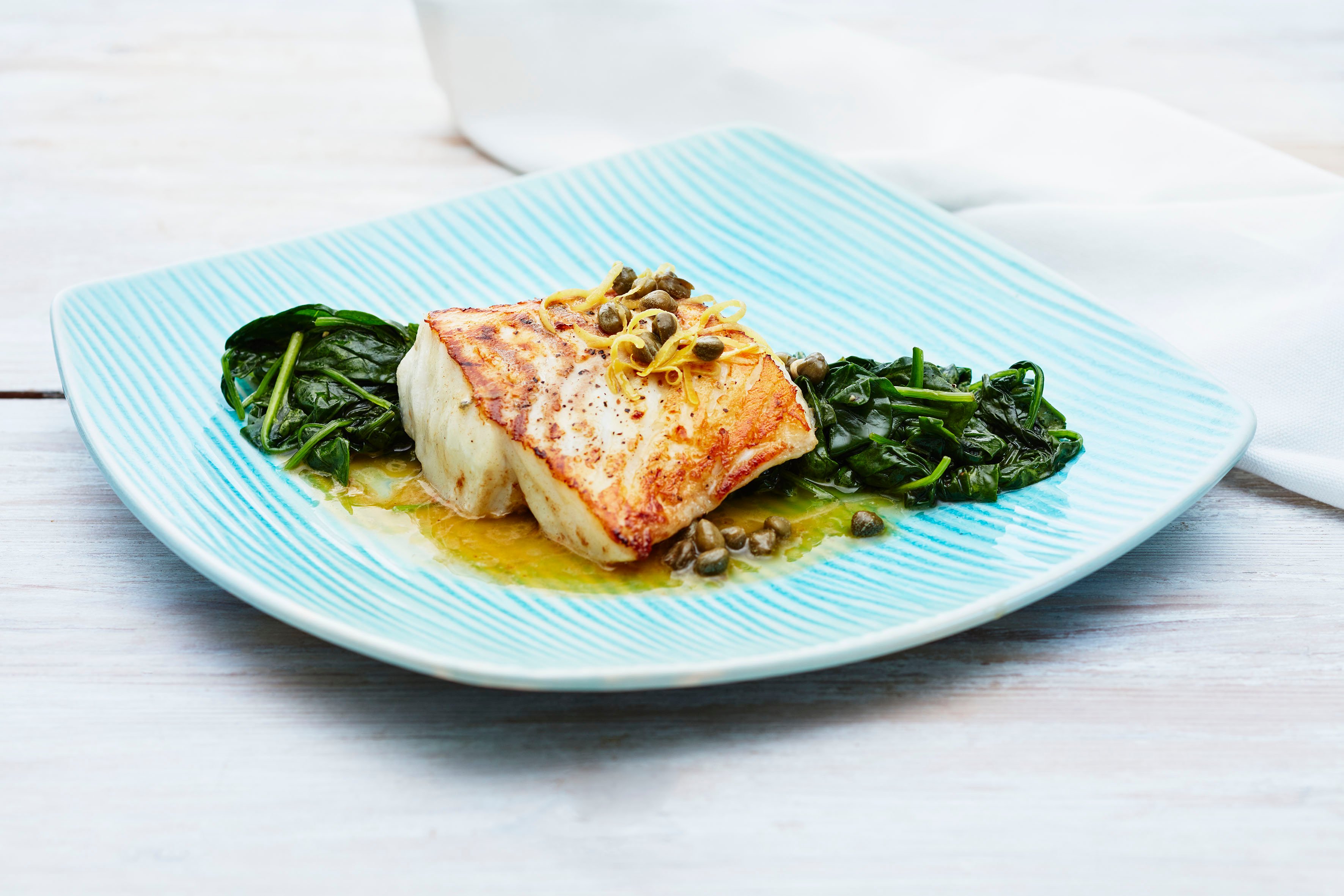 Torskeloin med spinat og kaperssmør